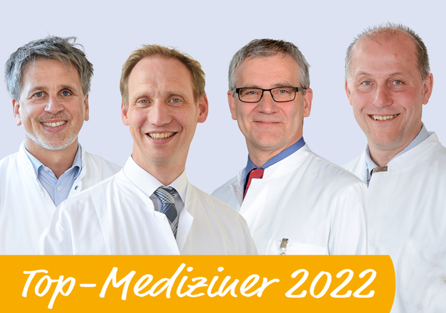 Dr. Alexander Prickartz, Dr. Peter Loeff, Prof. Dr. Detlef Rohde und Dr. Jochen Hoffmann mit Schriftzug Top Mediziner 2022